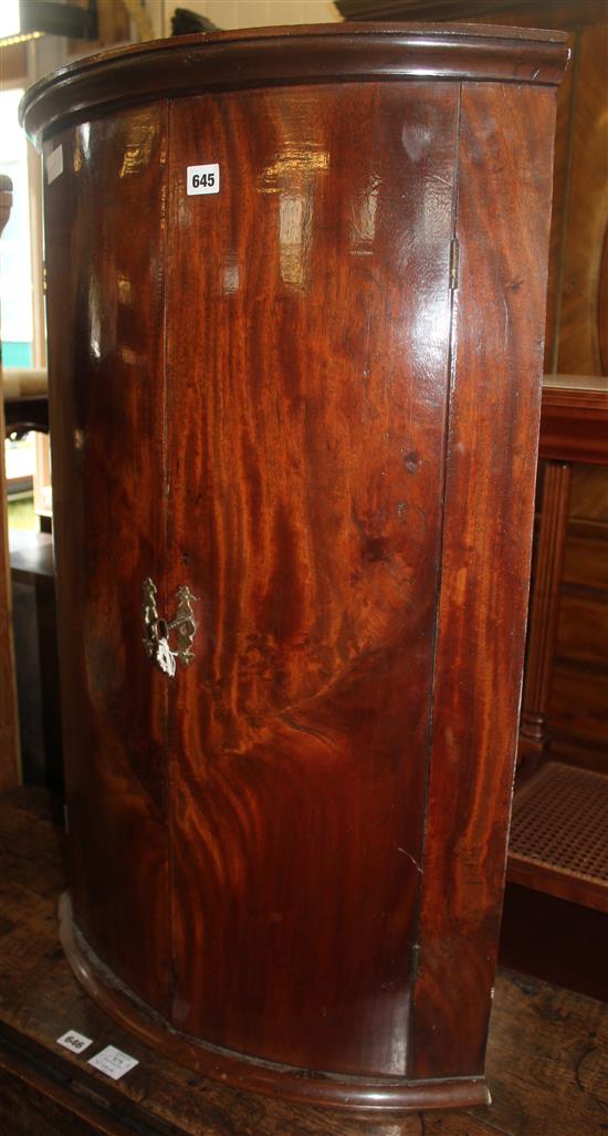 Cylinder corner cupboard